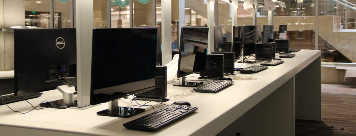 Room with computers and keyboards image